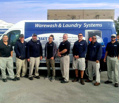 Owens Distributors Route Specialists in Front of Warehouse in Sanford, Central Florida